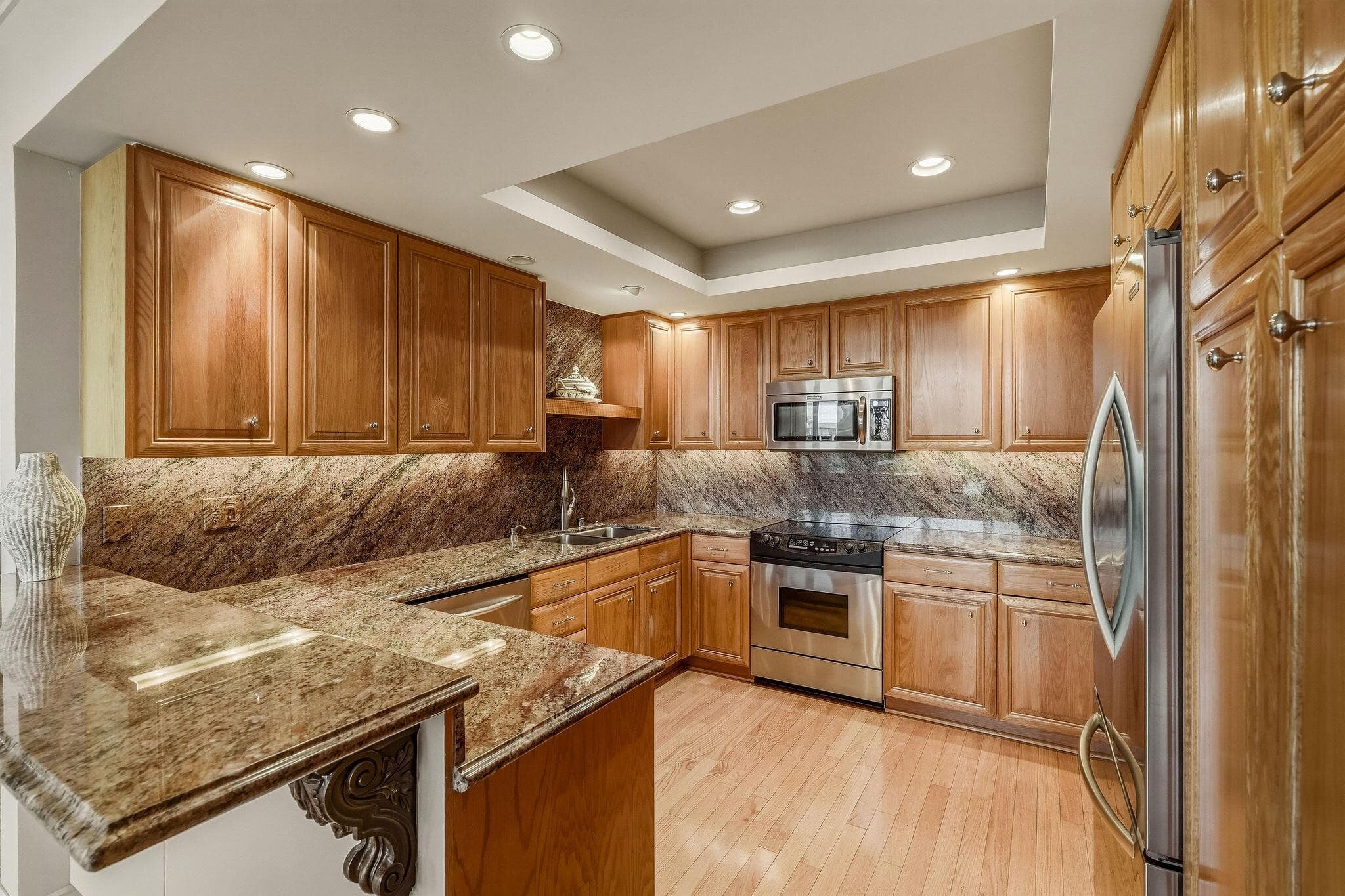 Slab granite and stainless appliances.