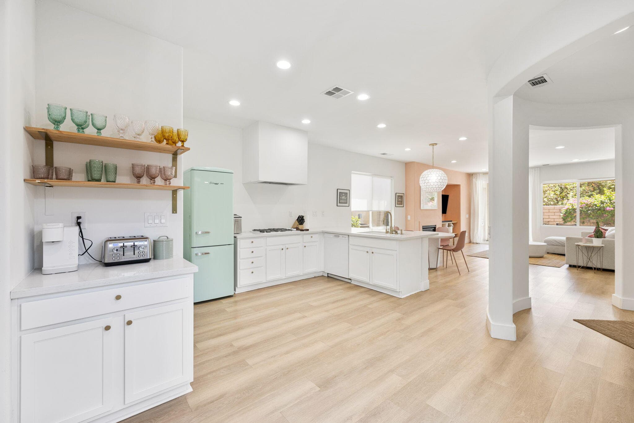 Bright, airy kitchen with stylish retro accents and open-concept flow.